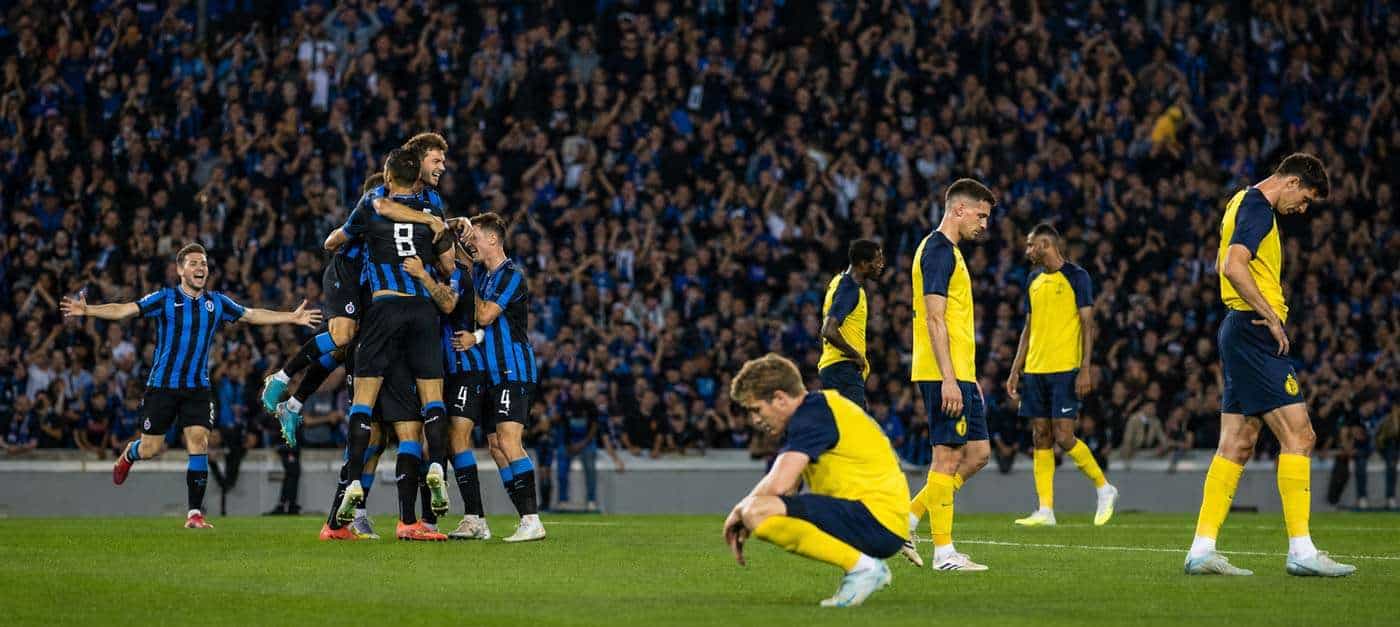 Illustration du match Club Brugge – Union SG 5-0 en Jupiler Pro League, avec les joueurs brugeois en célébration face aux joueurs de l’Union dépités.